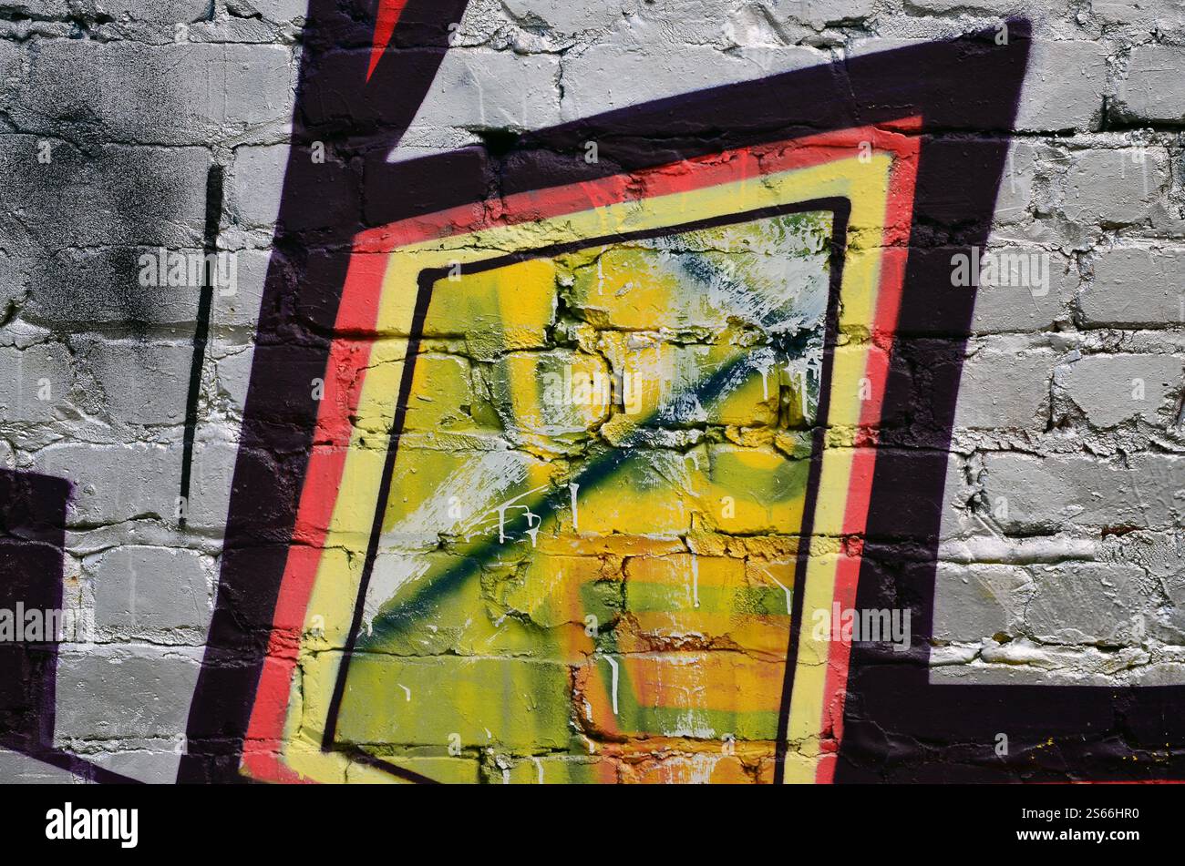 L'art de rue graffitis colorés sur le mur. Fragment dans l'arrière-plan. Résumé détail d'un graffiti Banque D'Images