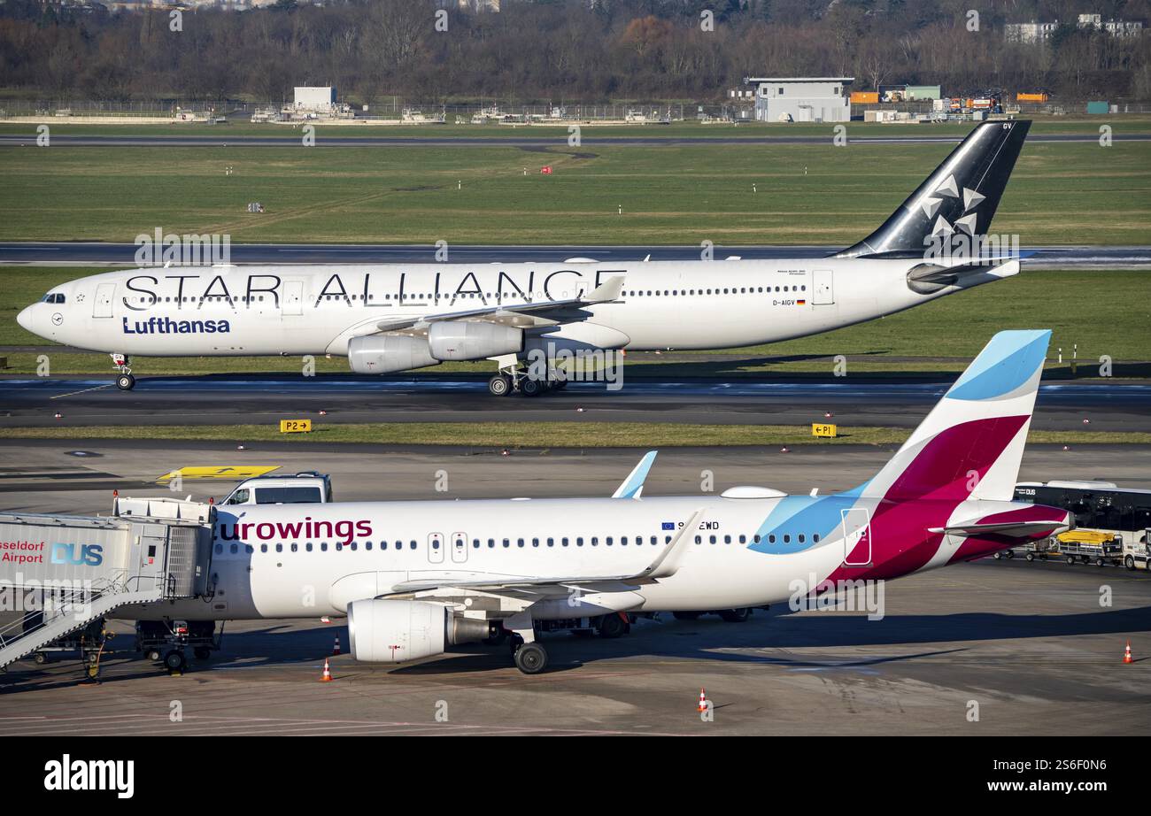 Lufthansa Airbus A340 sur le chemin du décollage, Eurowings Airbus au terminal, à l'aéroport de Duesseldorf, dus, Rhénanie du Nord-Westphalie, Allemagne, Europe Banque D'Images