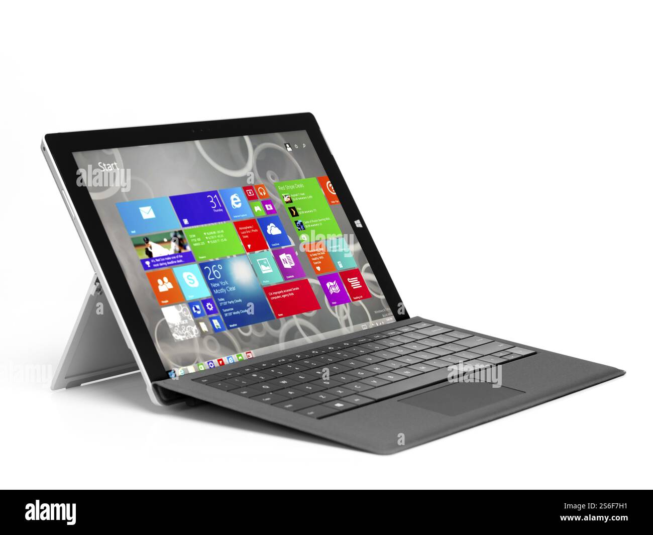 Tablette Microsoft Surface Pro 3 ordinateur avec un clavier noir et l'écran de démarrage sur son affichage isolé sur fond blanc Banque D'Images