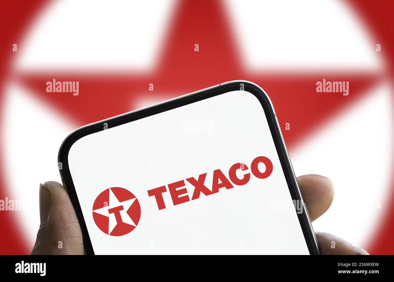 Le logo Texaco est affiché sur le smartphone Banque D'Images