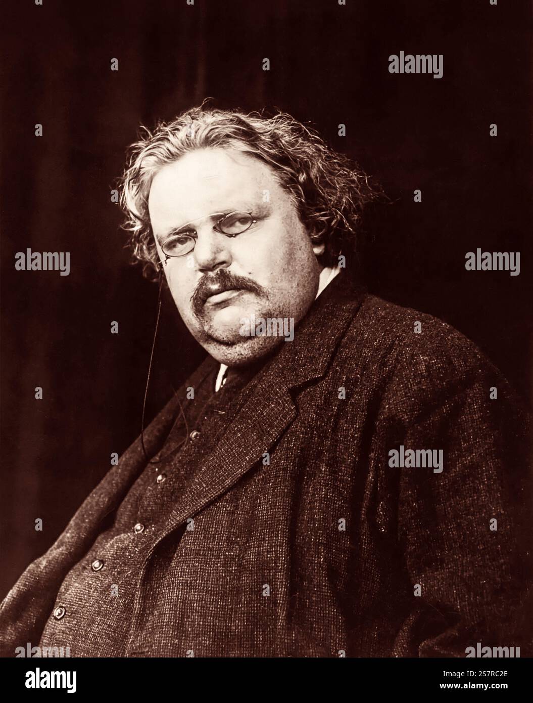 Portrait de G.K. (Gilbert Keith) Chesterton (1874-1936), auteur britannique, penseur, journaliste, critique d'art, débat, théologien laïc et apologiste chrétien du début du XXe siècle. Banque D'Images