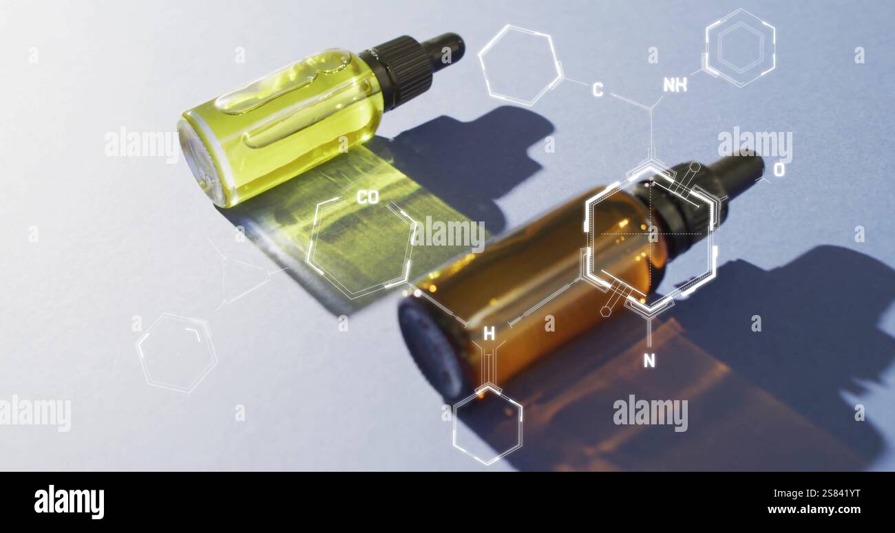 Image de la formule chimique au-dessus des flacons Banque D'Images
