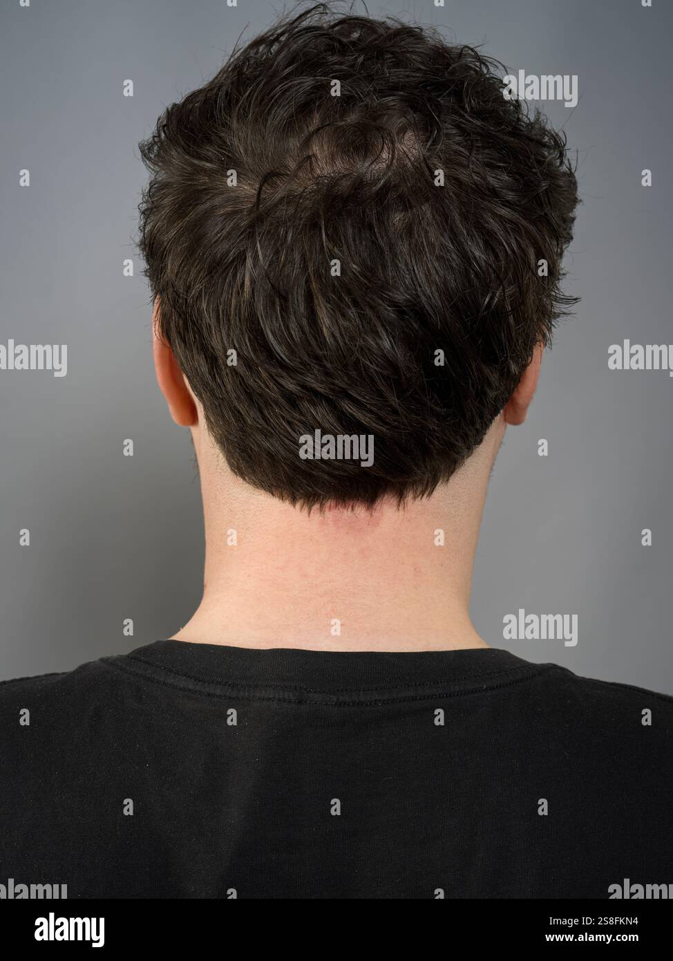 Vue arrière des cheveux de l'homme Banque D'Images