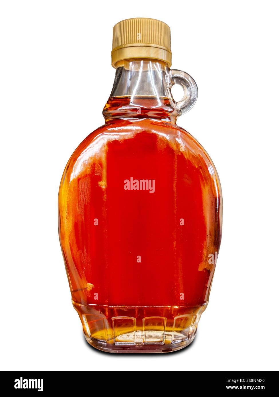 Sirop d'érable canadien dans une petite bouteille en verre isolé sur blanc, avec chemin de coupe Banque D'Images