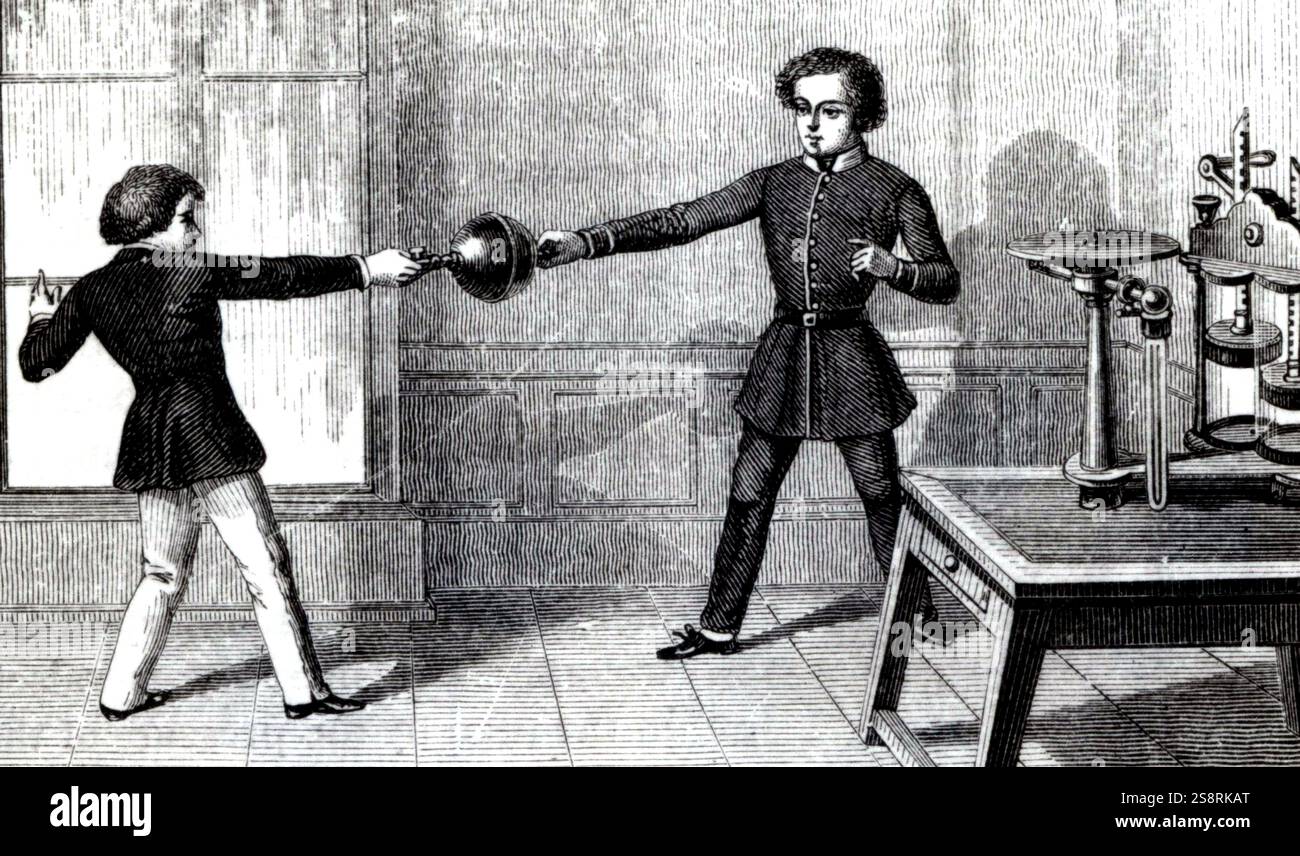 Gravure représentant deux garçons essayant de séparer deux hémisphères de Magdebourg. Les hémisphères de Magdebourg sont une paire de cuivre avec de grands hémisphères, les jantes. Ils ont été utilisés pour démontrer la puissance de la pression atmosphérique. Quand les bords ont été scellés avec de la graisse et l'air était pompée, la sphère contenait un vide et ne pouvait pas être arraché par des équipes de chevaux. En date du 19e siècle Banque D'Images