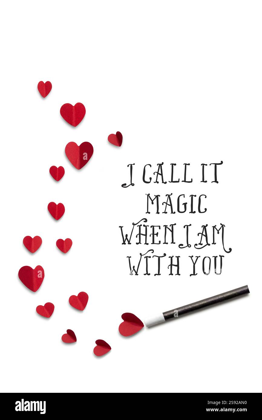 Photo créative de concept Valentines d'une baguette magique avec des coeurs sur un fond blanc Banque D'Images