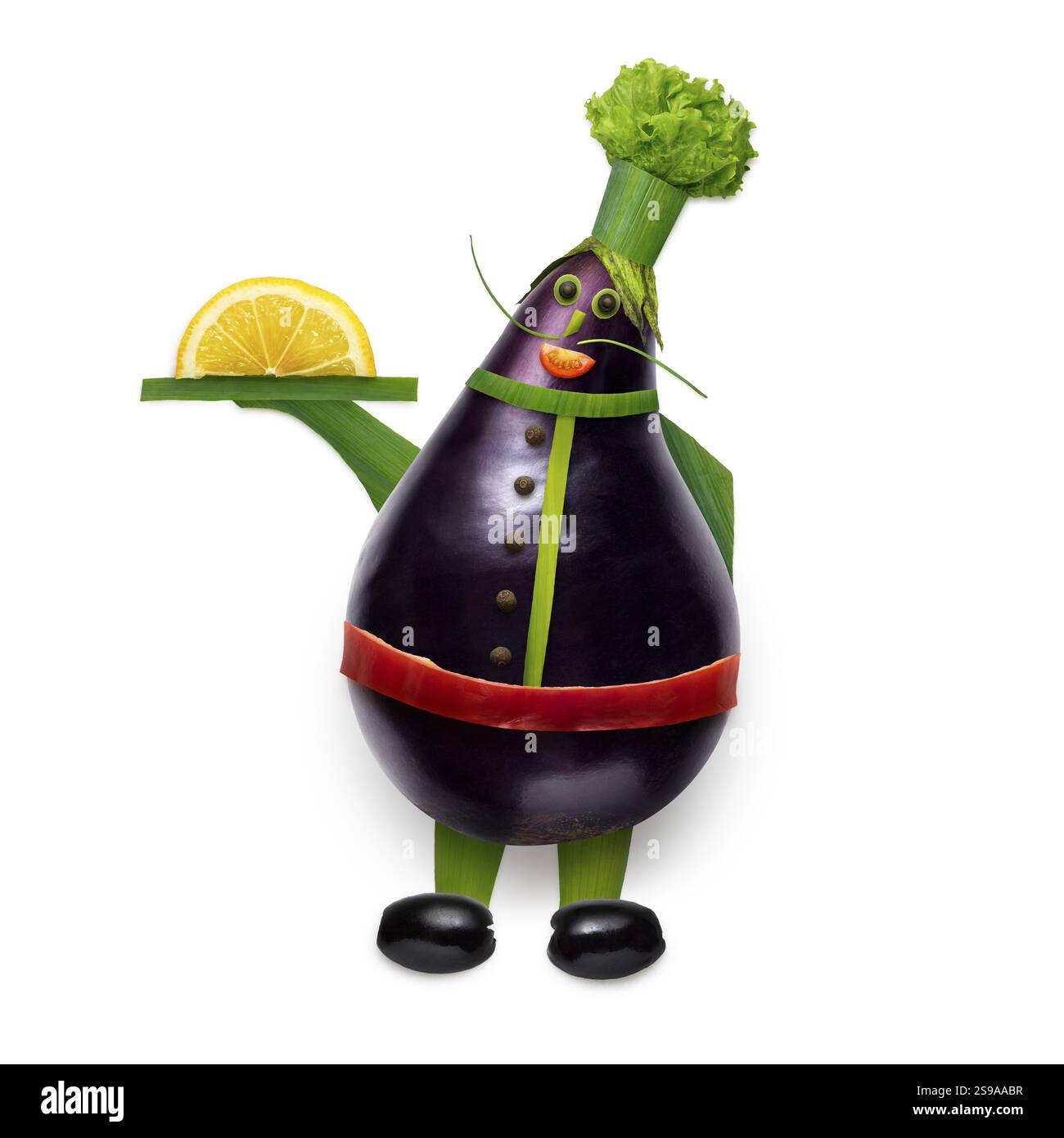 Concept de nourriture créative d'un chef de bande dessinée drôle fait de légumes sur un fond blanc Banque D'Images