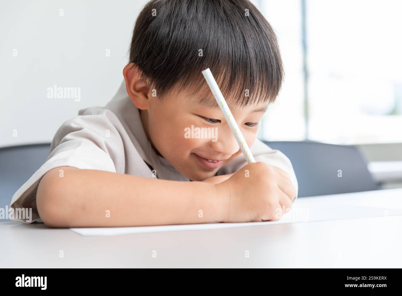 Garçon étudiant heureux Banque D'Images