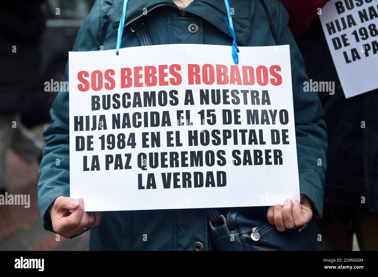 A woman with a sign during a rally of stolen, adopted and appropriated ...