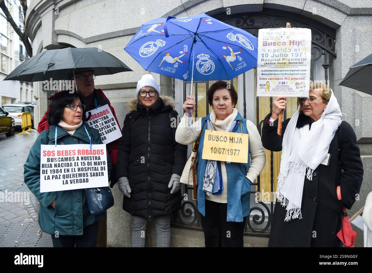Several people with posters during a rally of stolen, adopted and ...