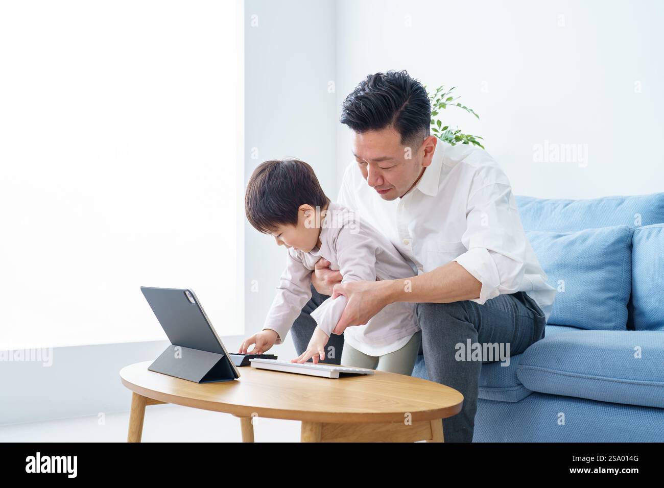 Saisie parent et enfant sur le clavier Banque D'Images