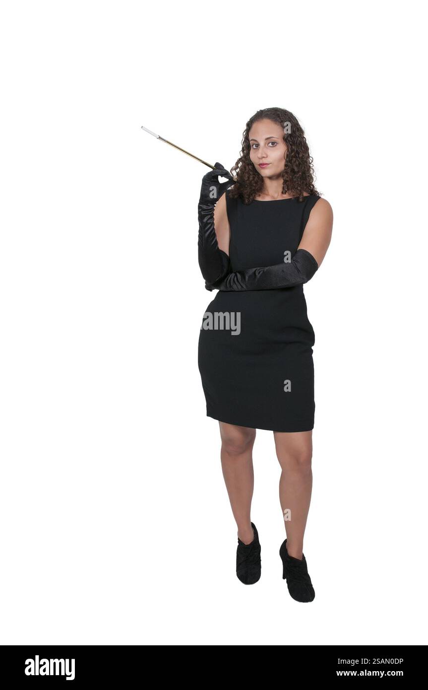 Belle femme fumant une cigarette avec un support Banque D'Images