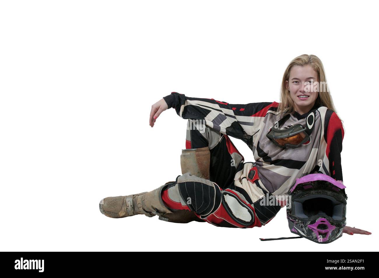 Belle femme dans un costume de moto de motocross Banque D'Images