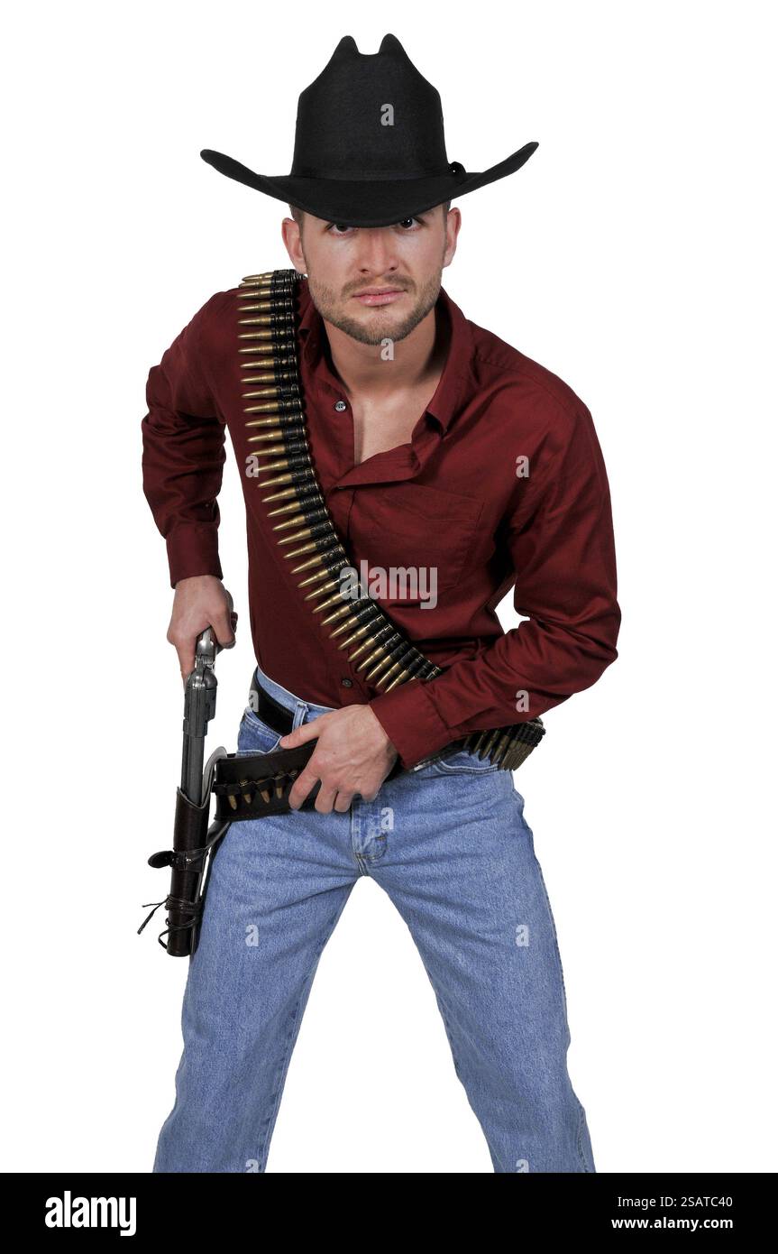 Beau cowboy homme avec six canons de tir Banque D'Images