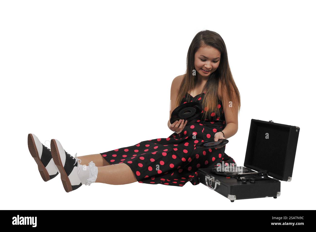 Belle femme adolescente avec enregistrement unique vintage 45 Banque D'Images