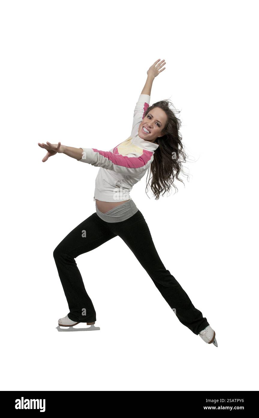Belle jeune femme patineuse artistique sur patins à glace Banque D'Images
