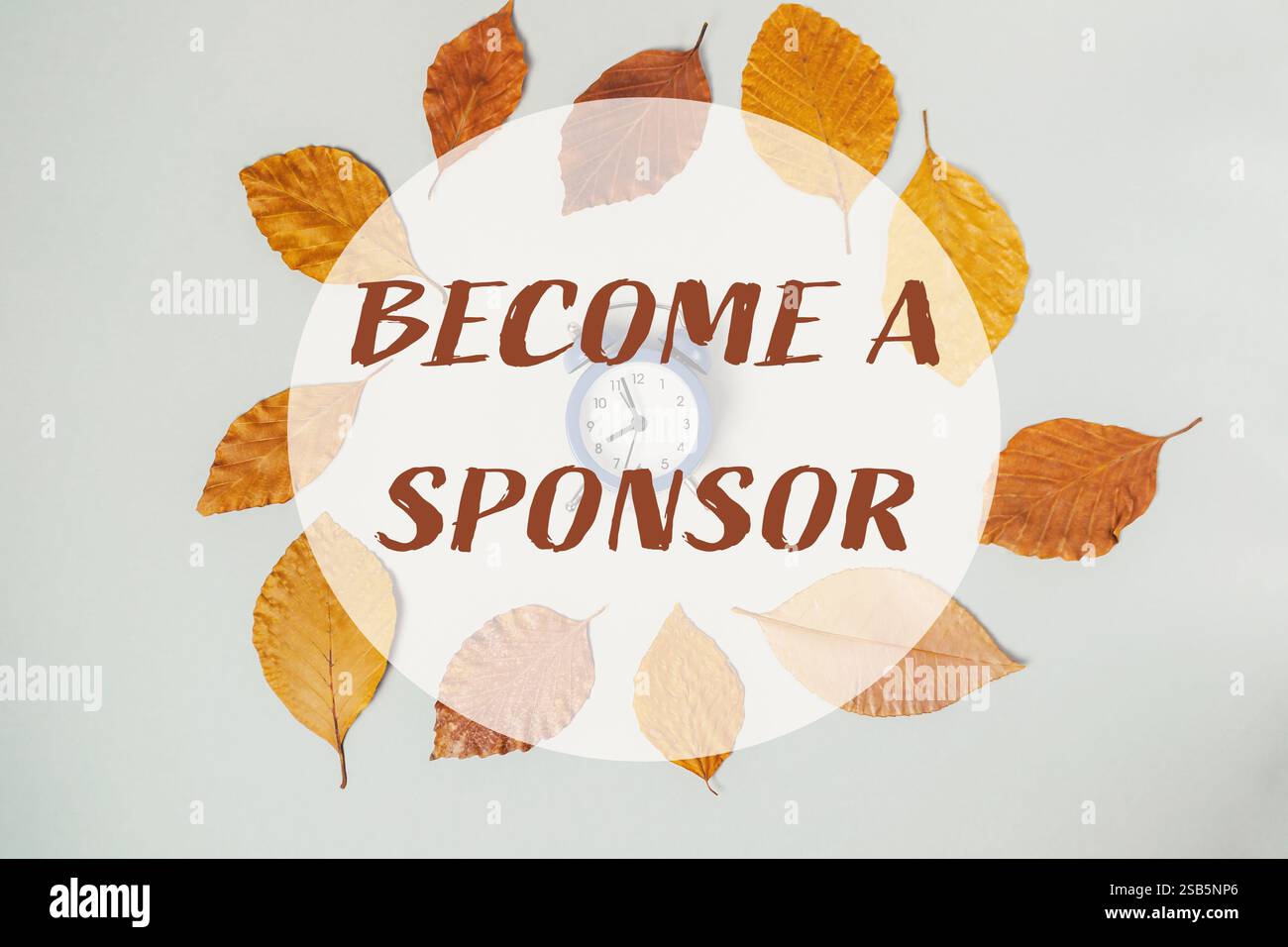 Cercle feuillu avec une horloge au centre et les mots deviennent un sponsor écrit autour de lui Banque D'Images