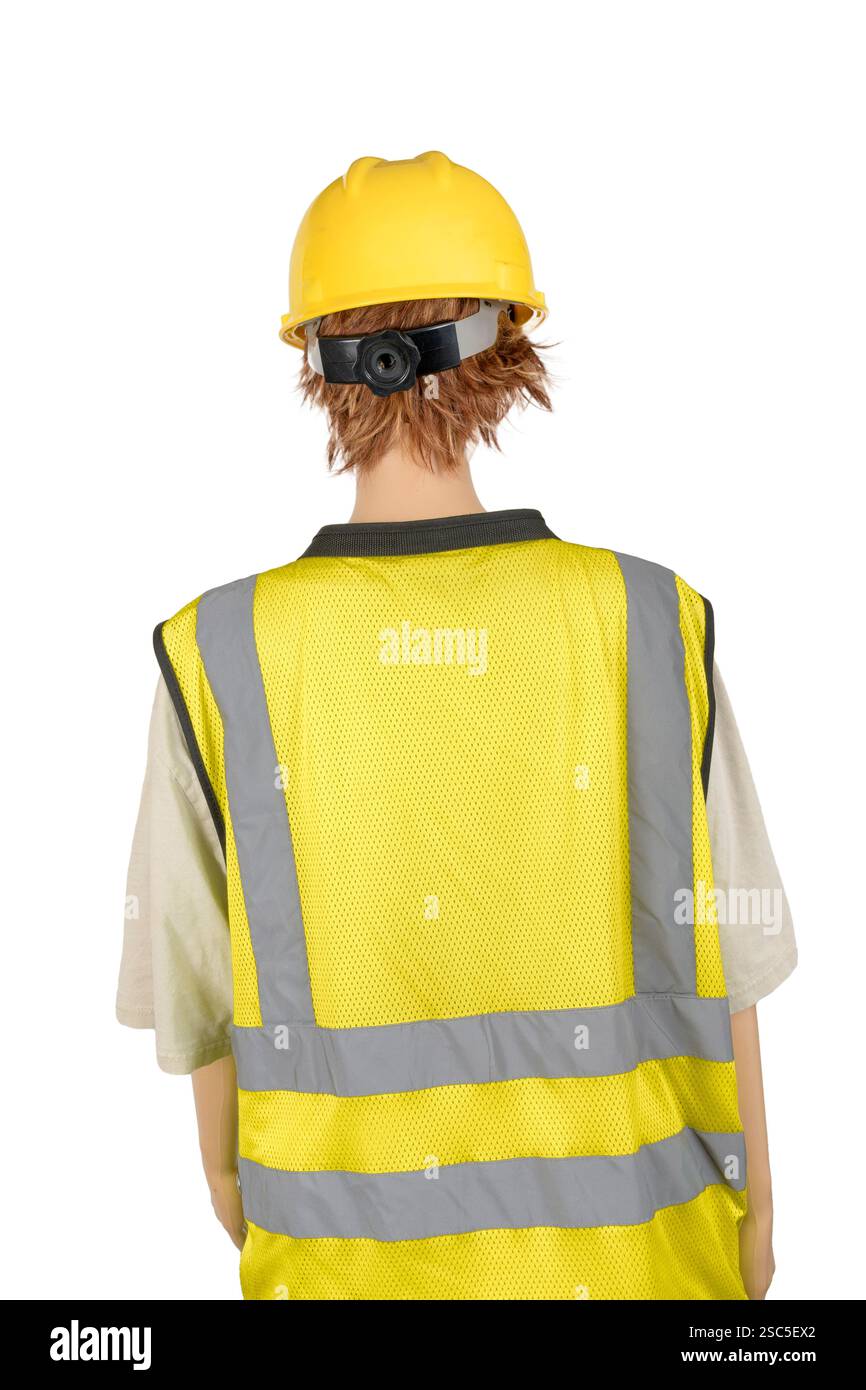 Plan vertical du dos d'un mannequin féminin en tenue de construction avec espace de copie sur le gilet. Banque D'Images