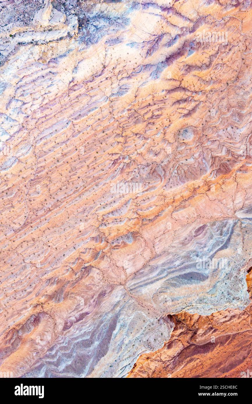 Vue aérienne de textures complexes et colorées au Vermilion Cliffs National Monument, Arizona, mettant en valeur la beauté naturelle et les formations géologiques de Banque D'Images