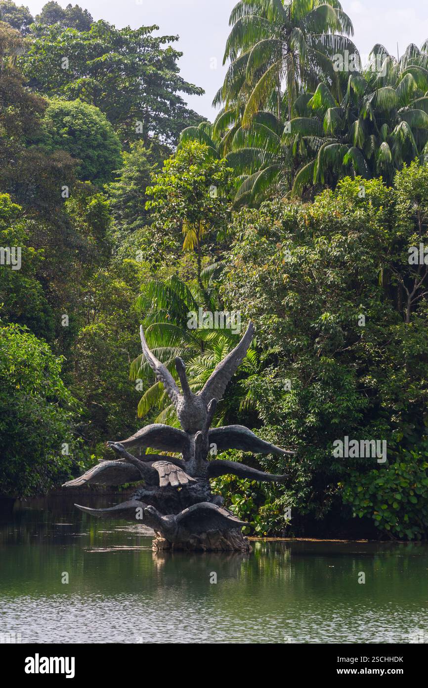 Vue verticale de la sculpture en bronze Flight of Swans, jardins botaniques de Singapour. Banque D'Images
