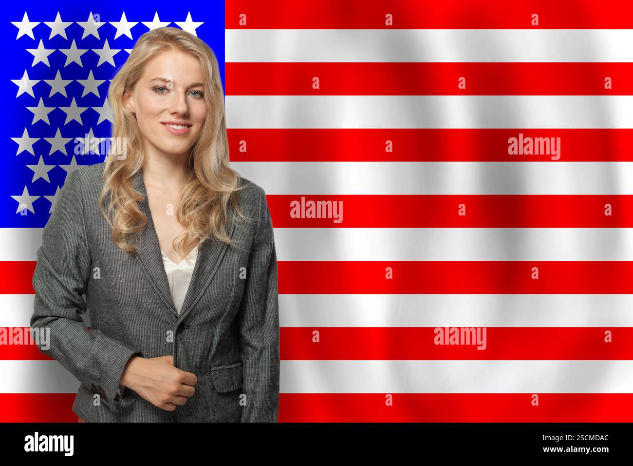 Belle femme heureuse avec drapeau des États-Unis Banque D'Images