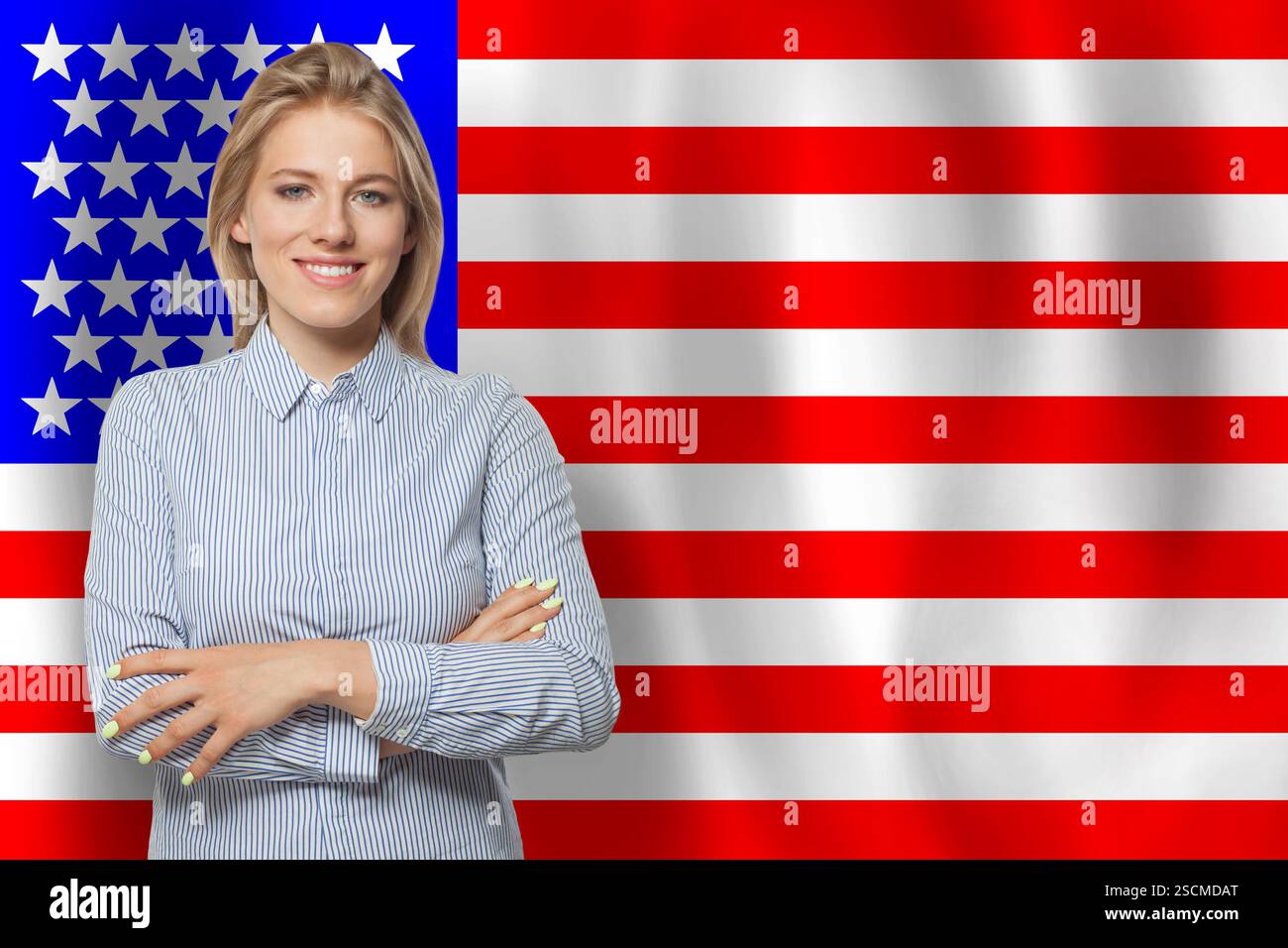 Femme heureuse réussie avec drapeau des États-Unis Banque D'Images