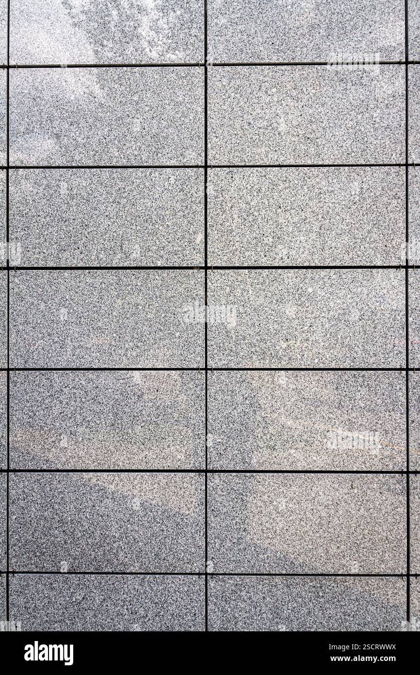 Fond de texture de tuile de pierre grise sur le mur extérieur. Détail architectural. Banque D'Images