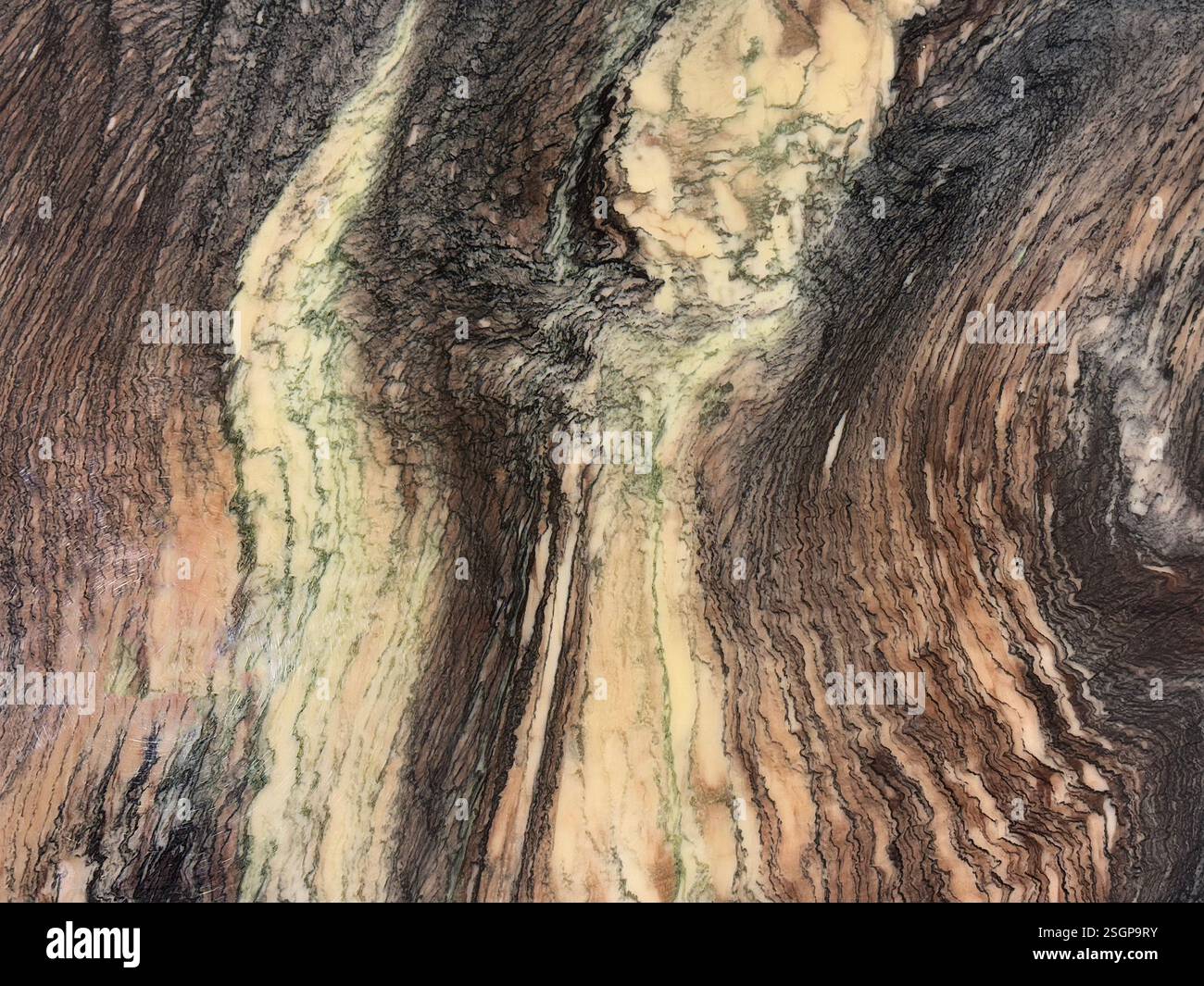 Gros plan de la texture de pierre de marbre dans un motif aléatoire brun, noir et beige. Formation d'un motif de courant. Texture d'arrière-plan transparente. Banque D'Images