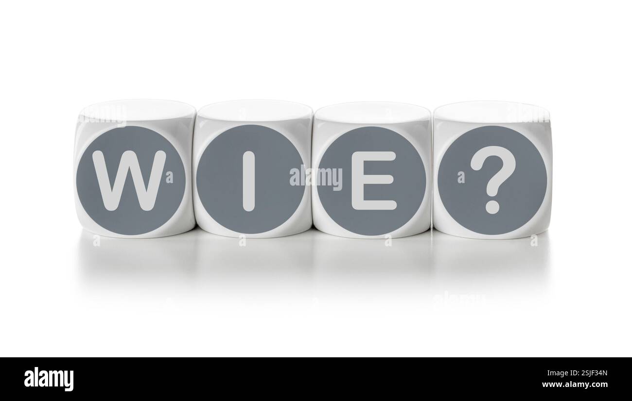 Cubes de lettres sur un fond blanc - Comment Banque D'Images