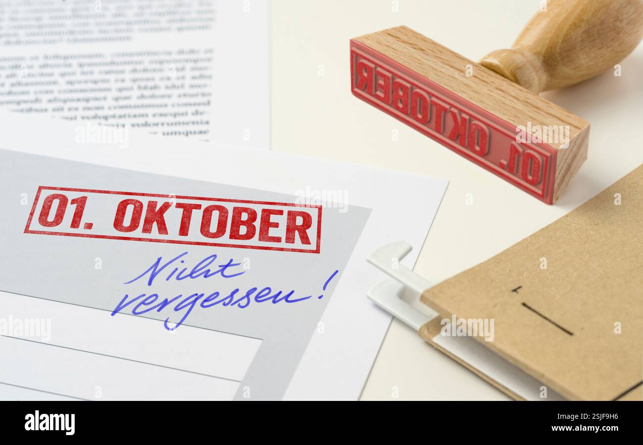 Timbre rouge sur les documents - 1er octobre Banque D'Images