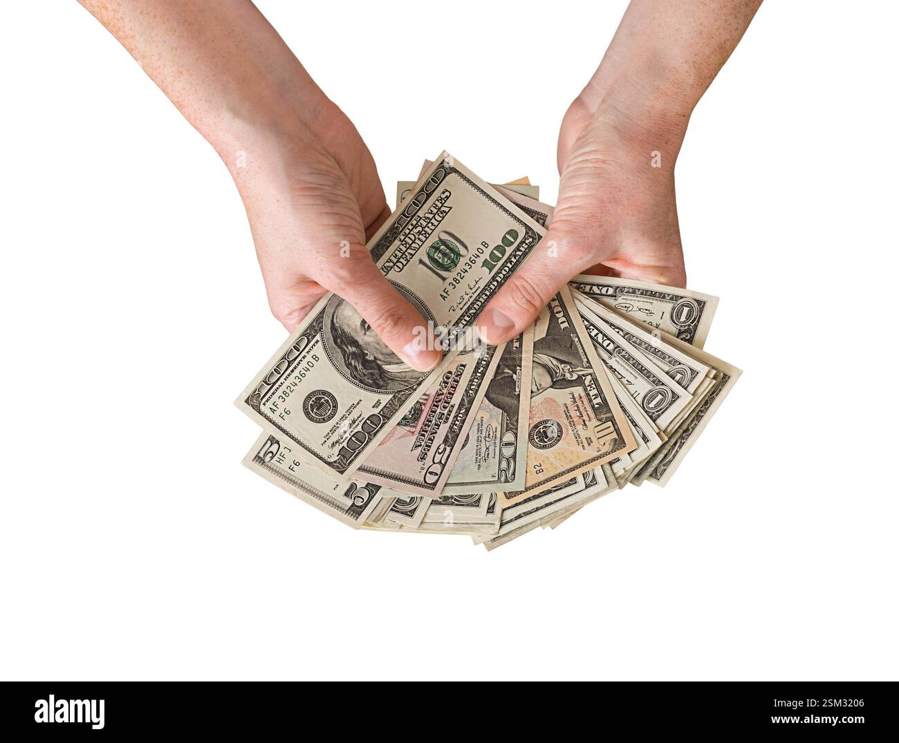 Les mains de la personne tenant ventilé les dollars américains en argent liquide isolé découpe sur blanc Banque D'Images