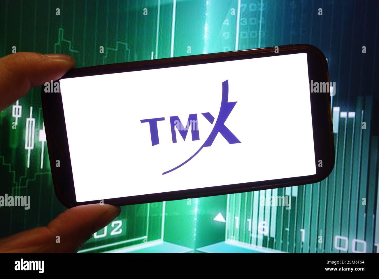 Dans cette illustration photo, le logo de la société Groupe TMX limitée est affiché sur l'écran d'un téléphone intelligent. Banque D'Images