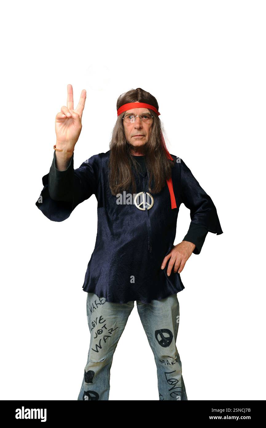 Homme portant une robe fantaisie hippy rétro pour la fête. Banque D'Images