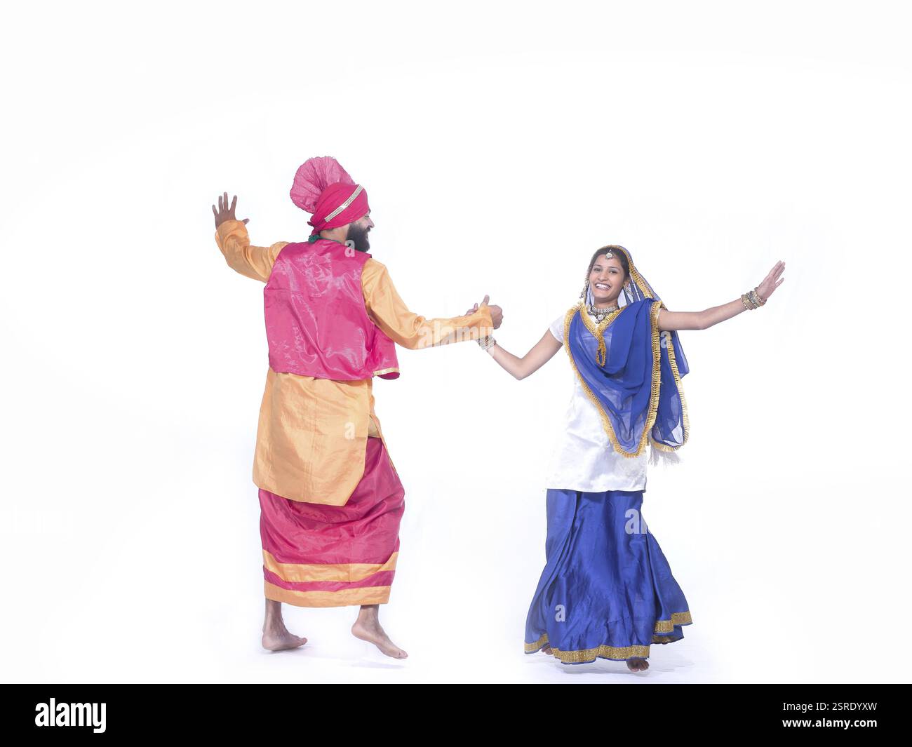 Danseurs interprétant la danse folklorique bhangra MR#779B, 779D. Banque D'Images Danseurs interprétant la danse folklorique bhangra MR#779B, 779D. Banque D'Images