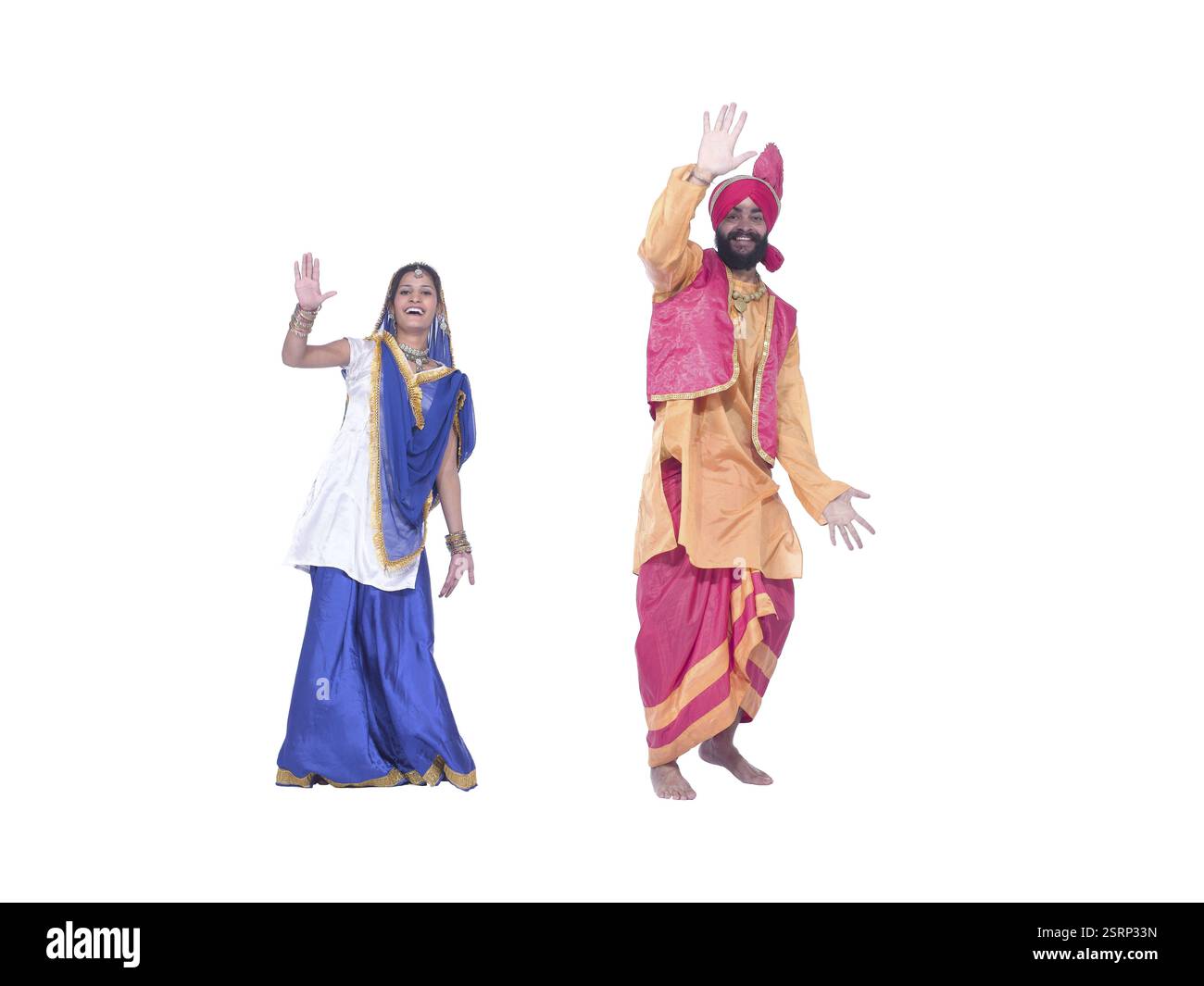 Danseurs interprétant la danse folklorique bhangra MR#779D, 779B. Banque D'Images Danseurs interprétant la danse folklorique bhangra MR#779D, 779B. Banque D'Images