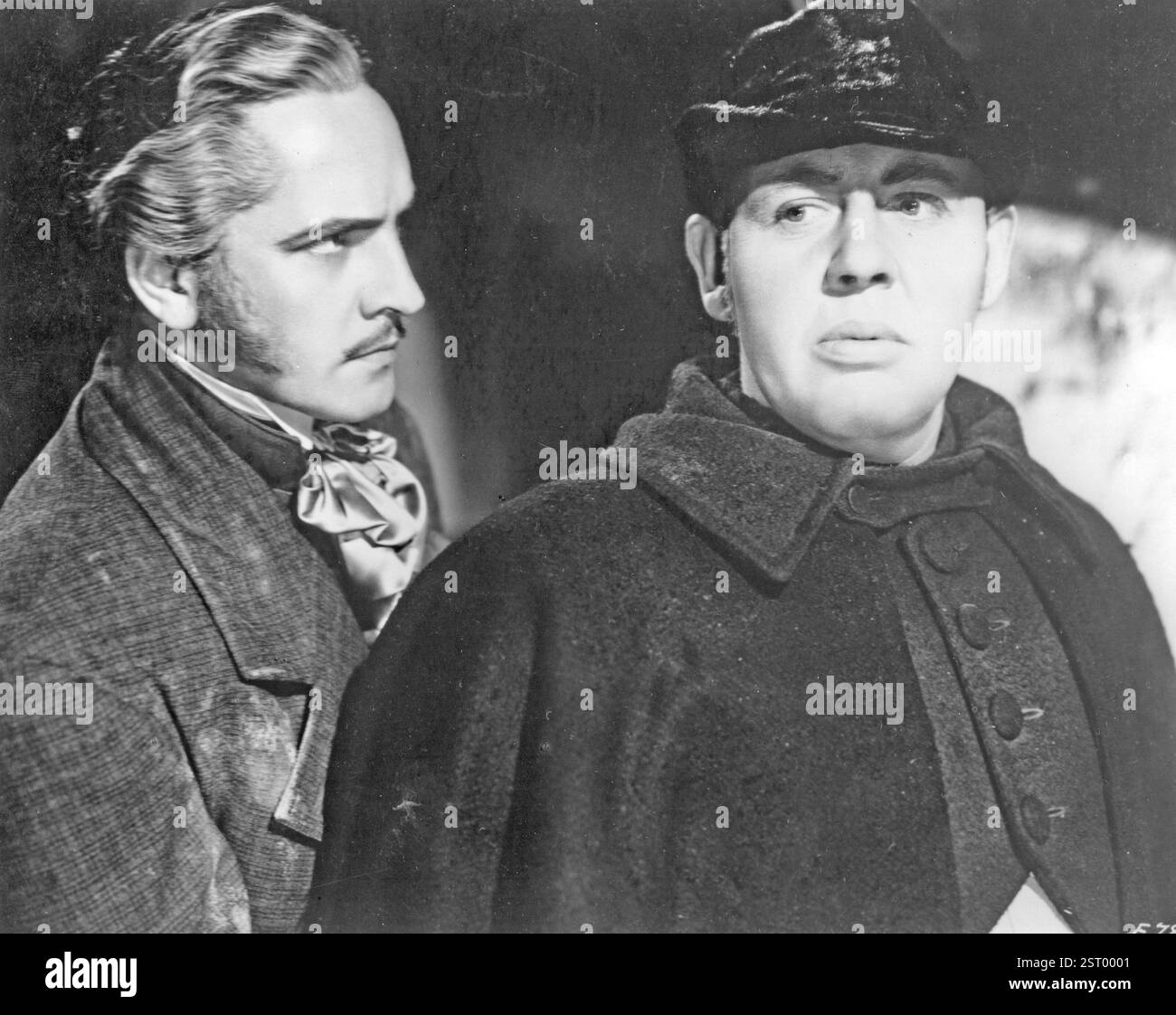 LES MISÉRABLES FREDRIC MARCHE dans le rôle de Jean Valjean, CHARLES LAUGHTON dans l'inspecteur Javert LES MISÉRABLES date : 1935 Banque D'Images