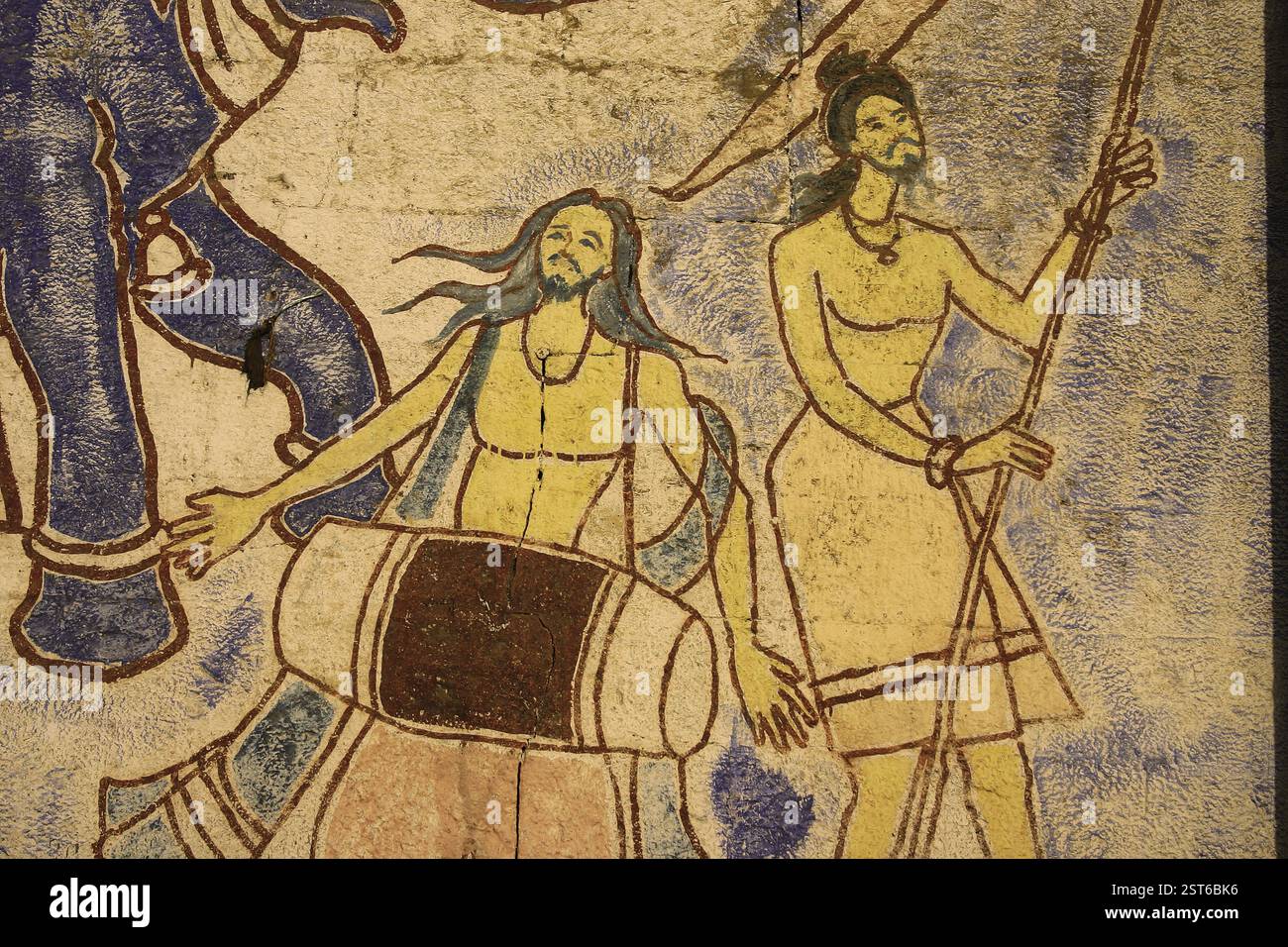 Peinture murale, homme jouant instrument de musique indien tambour connu sous le nom de Mridangam, Ram Ghat, sur la rive de la rivière Narmada, Ujjain, Madhya Pradesh, Inde, Asie Banque D'Images