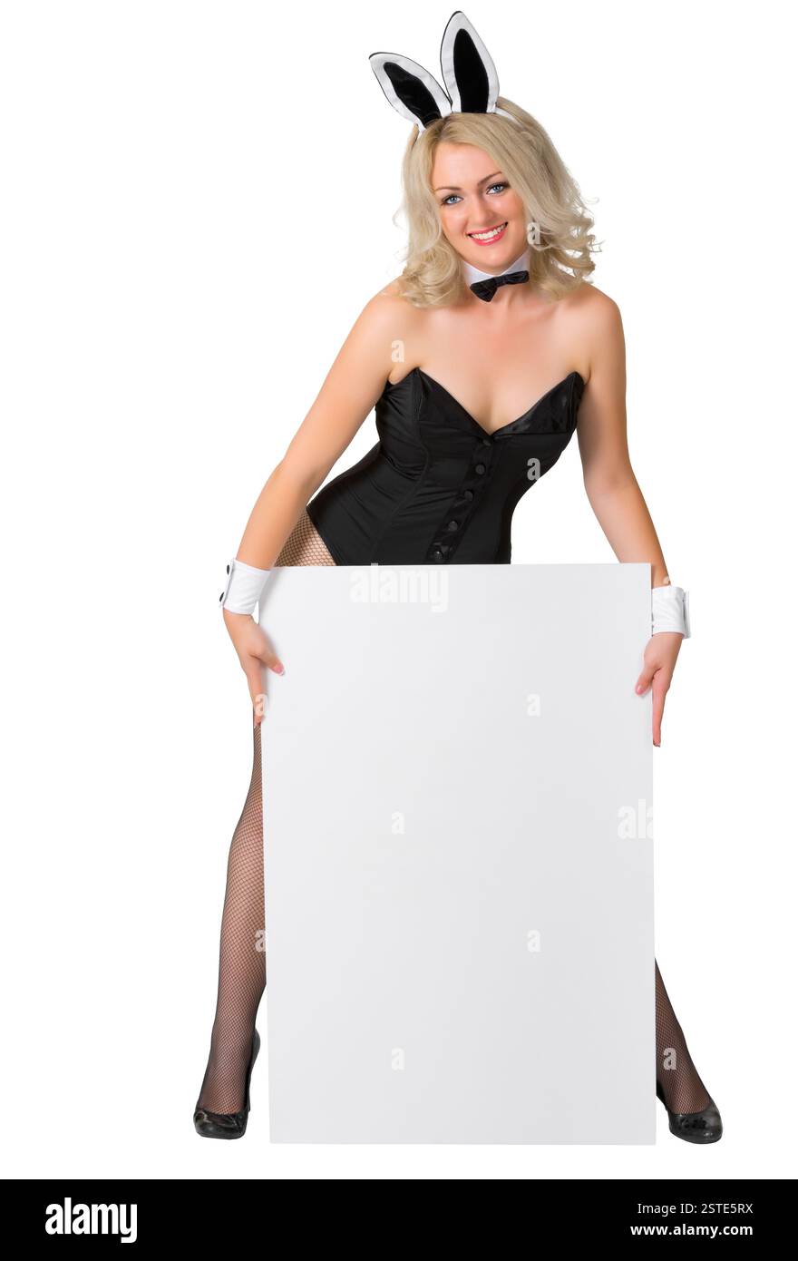 Belle blonde dans un costume de lapin avec bannière sur fond blanc Banque D'Images