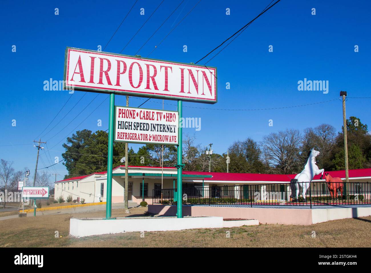 Style rétro Airport Road culture Motel avec une façade rose en Caroline du Nord lors d'un roadtrip Banque D'Images