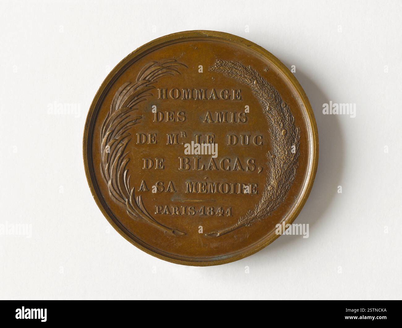Un médaillon de 1841 de L. Dubour représentant le buste gauche du duc de Blacas, avec une inscription inversée entourée d'une branche de palmier à gauche et d'une branche de pin à droite, commémorant son héritage. Banque D'Images