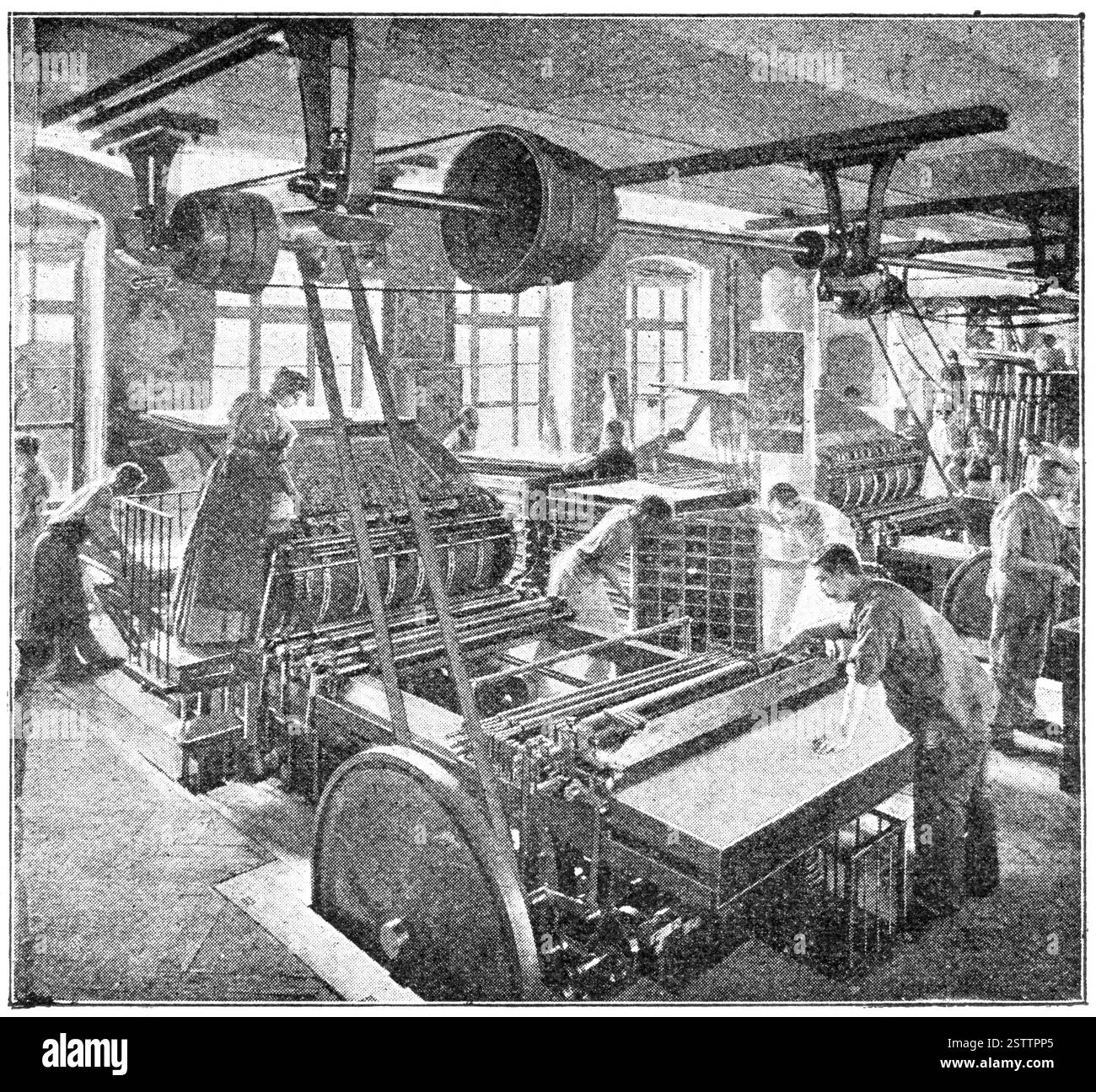 Impression de lithographies dans l'atelier. Illustration du XIXe siècle. Fond blanc. Banque D'Images