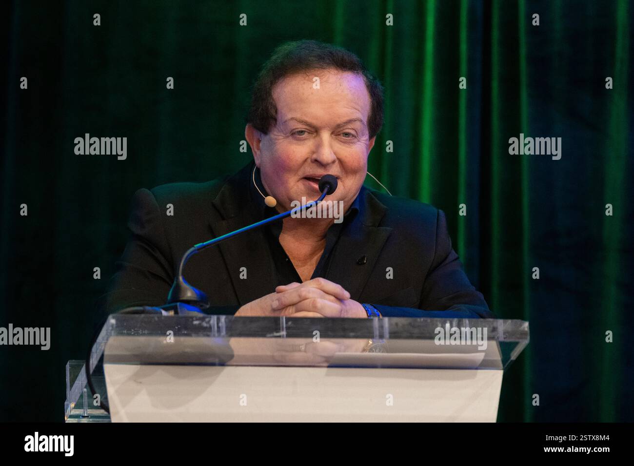 Marty Morrissey, commentateur sportif irlandais et présentateur de télévision, s'exprimant lors d'un événement à West Cork, en Irlande. Banque D'Images