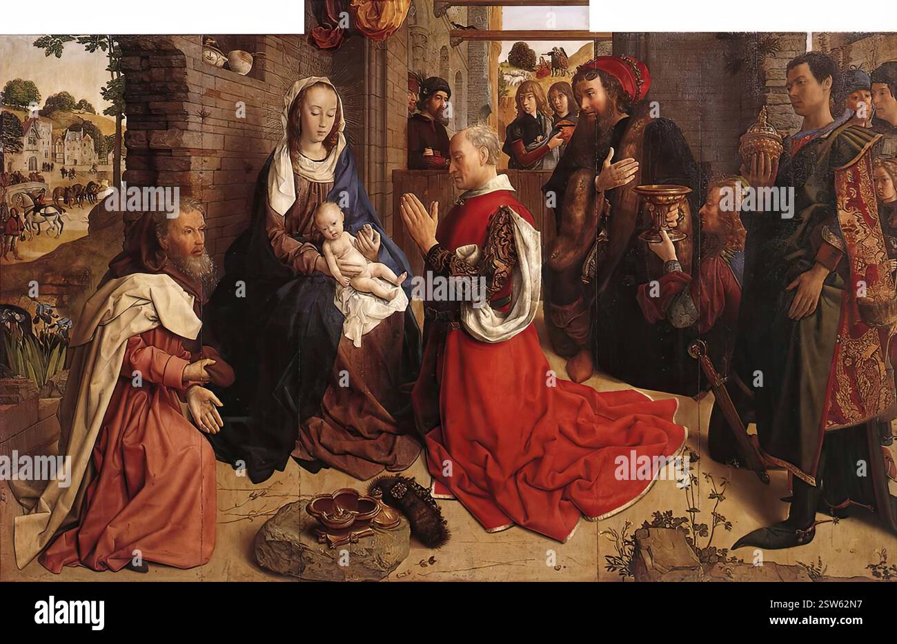 GOES, Hugo van der (né vers 1440, Gand, d. 1482, Bruxelles) retable Monforte vers 1470 huile sur bois, 150 x 247 cm Staatliche Museen, Berlin L'œuvre la plus brillante du début de van der Goes est le retable Monforte, nommé d'après la ville dans laquelle il a été logé, dans un collège appartenant à un groupe de Jésuites espagnols, avant d'être ensuite transféré au musée de Berlin. C'est un triptyque à grande échelle, dont seul le panneau central, un long rectangle horizontal, a survécu jusqu'à nos jours. Un groupe d'anges planants a été amputé du haut du panneau, an Banque D'Images