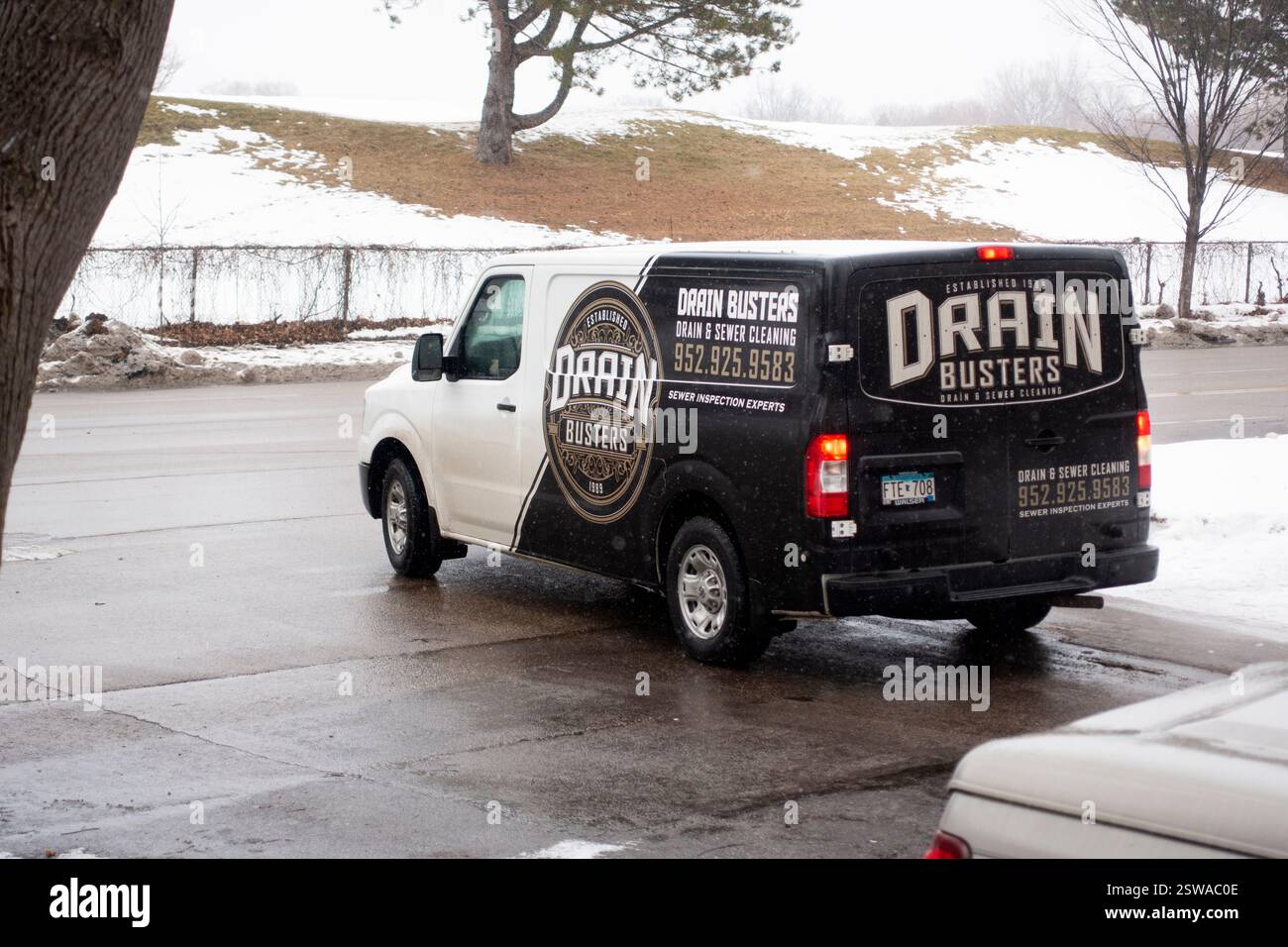 Drain Buster Truck dans le quartier spécialisé dans le nettoyage des drains et égouts bouchés. St Paul Minnesota MN États-Unis Banque D'Images
