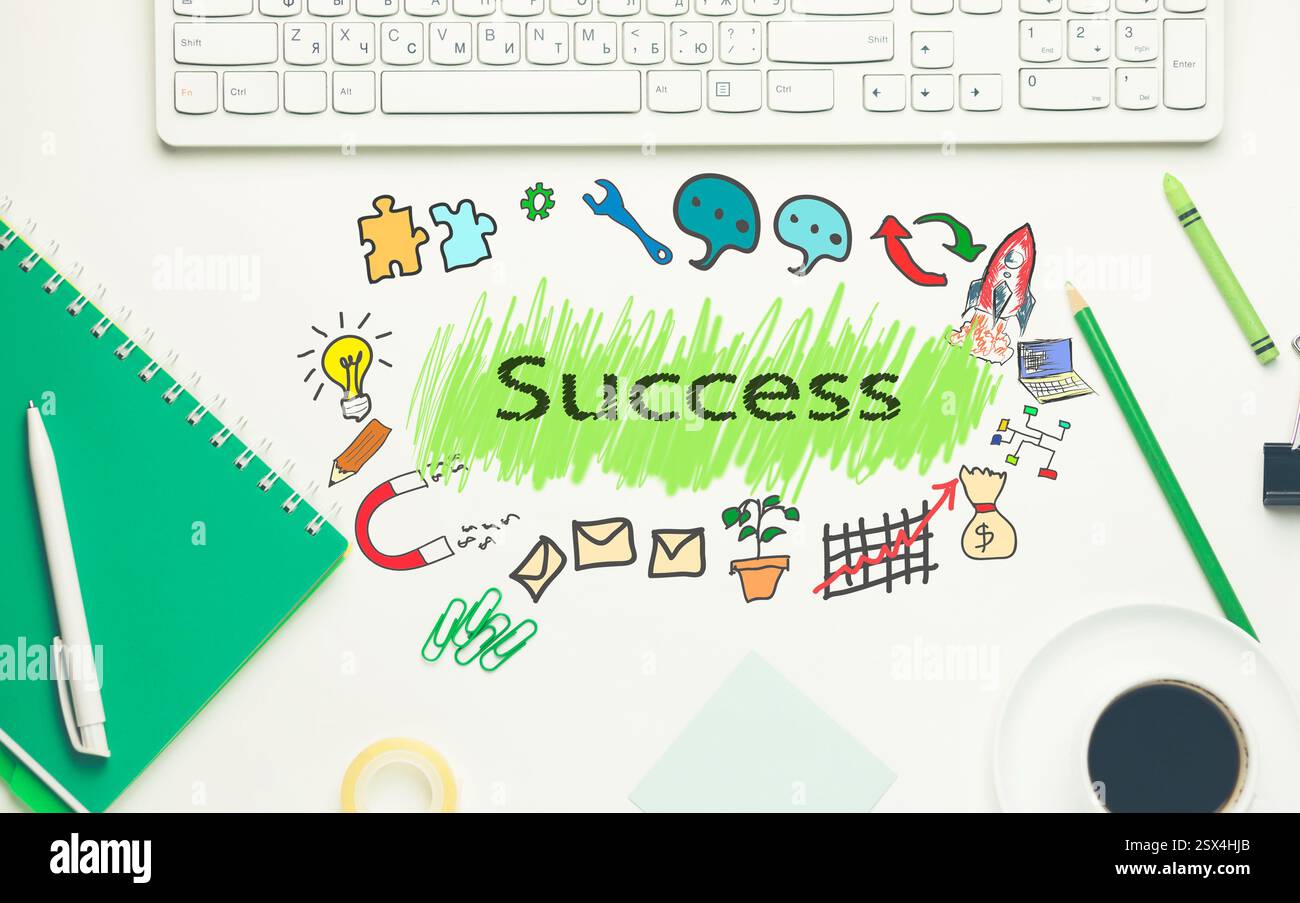 texte seccess avec clavier d'ordinateur et stationnaire Banque D'Images