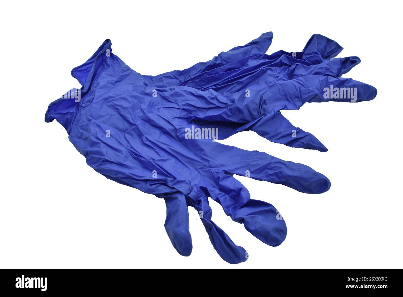 Gants fins en caoutchouc pour les tâches ménagères, bleus. Banque D'Images
