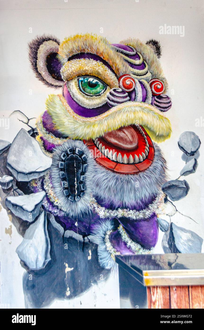Danse du lion hors du mur - Une œuvre d'art de danse du lion, éclatant à travers un mur avec des détails et des couleurs vibrantes, symbolisant la joie et la célébration culturelle Banque D'Images