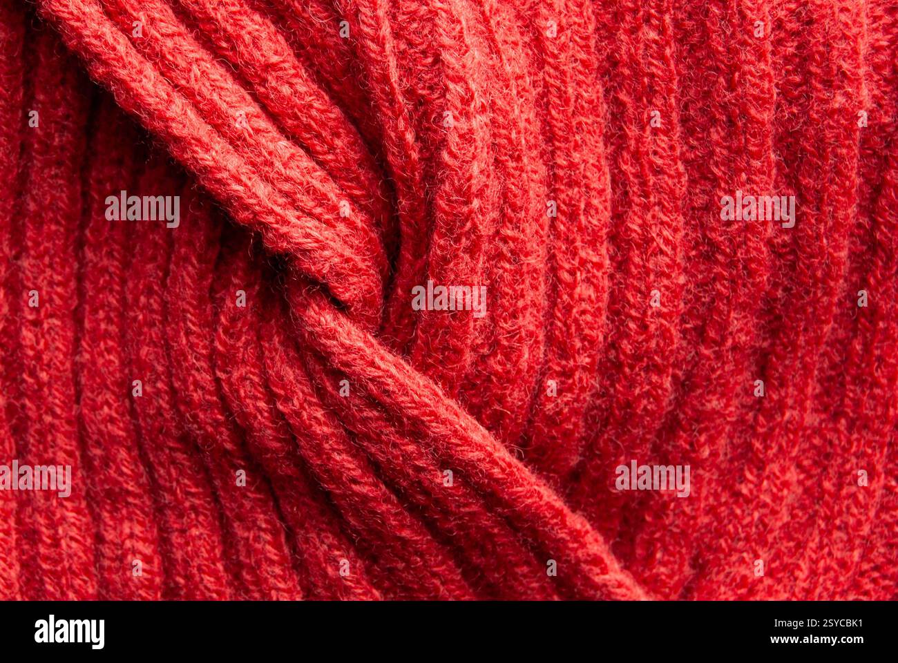 Tissu de pull d'hiver rose doux avec une texture confortable et chaude. Banque D'Images