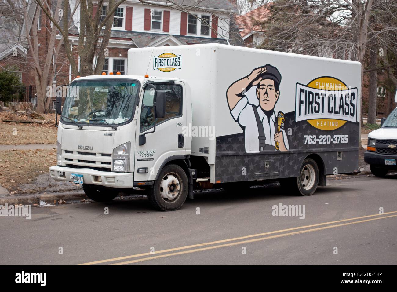 Camion résidentiel de plomberie et de chauffage pour une entreprise appelée First Class. St Paul Minnesota MN États-Unis Banque D'Images