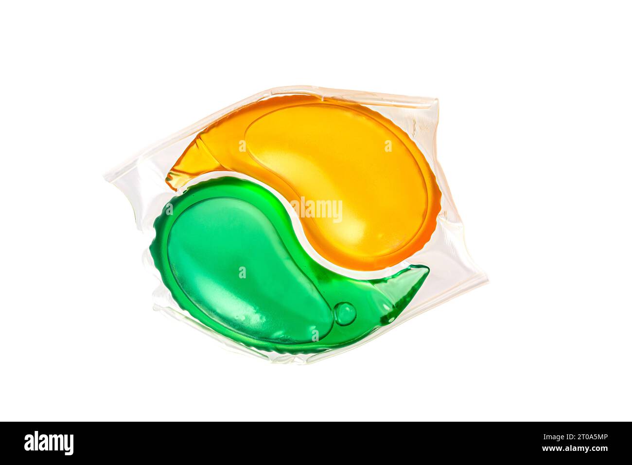 capsule de lavage ronde avec gel vert et jaune. Photo de haute qualité Banque D'Images